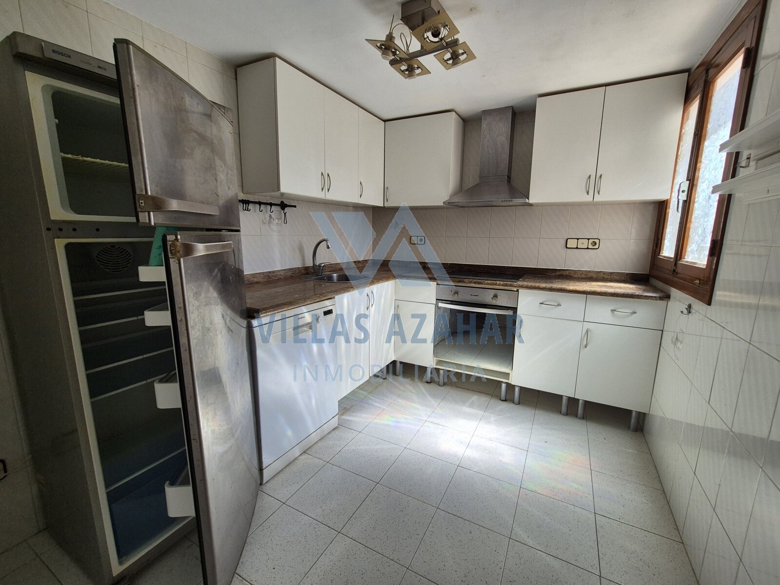 Chalet céntrico con piscina a reformar